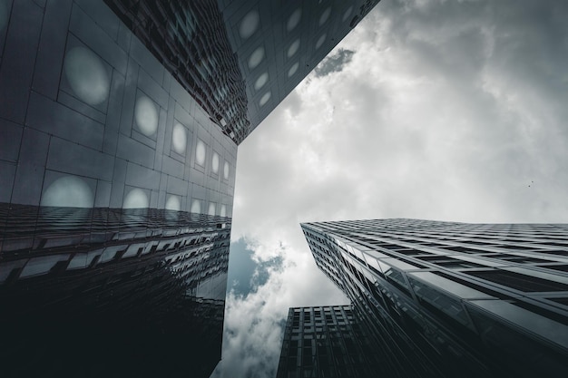 Directly below shot of modern buildings against sky