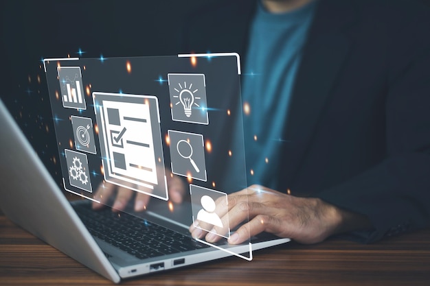 DMS is document management concept Man using a computer to document management in online documentation database and digital file storage system or software records keeping database technology