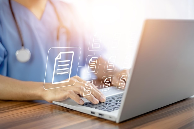 doctor using computer document management system dms online documentation database process automation to efficiently manage files