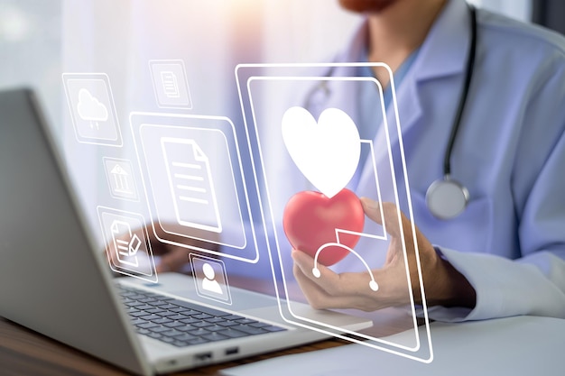 doctor using technology document management on computer system management for cardiologist