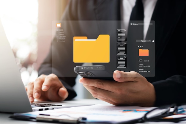document management system concept business man holding folder and document icon software searching and managing files online document database for efficient archiving and company data