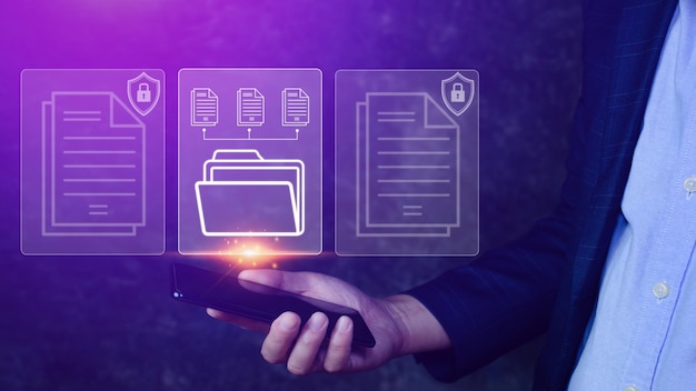document management system dms being setup it consultant working on smartphone software for archiving searching and managing corporate files information