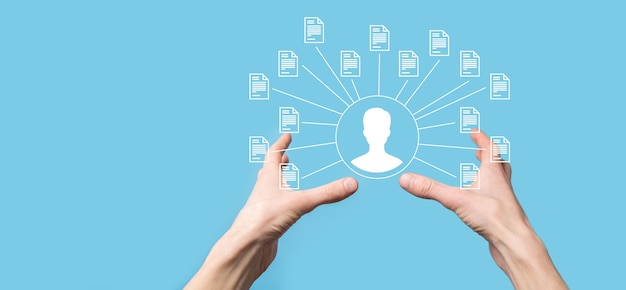 Document Management System DMS .Businessman hold user and document icon.Software for archiving, searching and managing corporate files and information.Internet Technology Concept.Digital security.