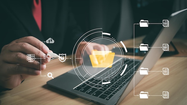 Document Management System DMS Businessman using digital documents to search store archive and manage and to reduce paper Solution for paperless office Digital business security process