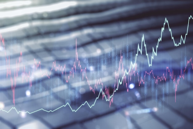 Double exposure of abstract creative financial chart hologram on blurry metal background research and strategy concept