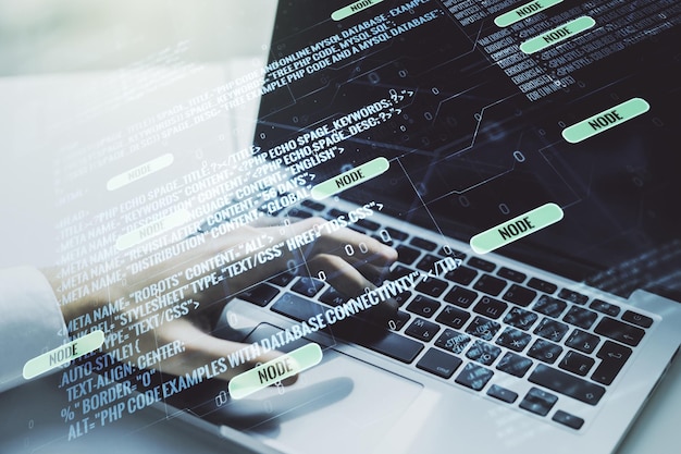 Double exposure of abstract programming language hologram with hands typing on laptop on background research and development concept