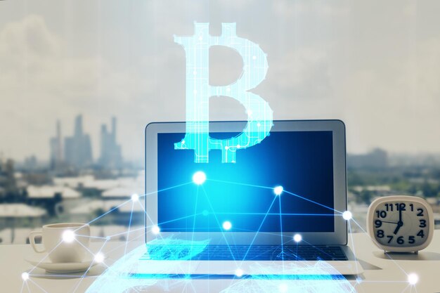 double exposure of blockchain and crypto economy theme hologram and table with computer background concept of bitcoin cryptocurrency