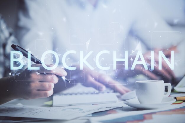 double exposure of blockchain theme drawing over people taking notes background concept of cryptocurrency