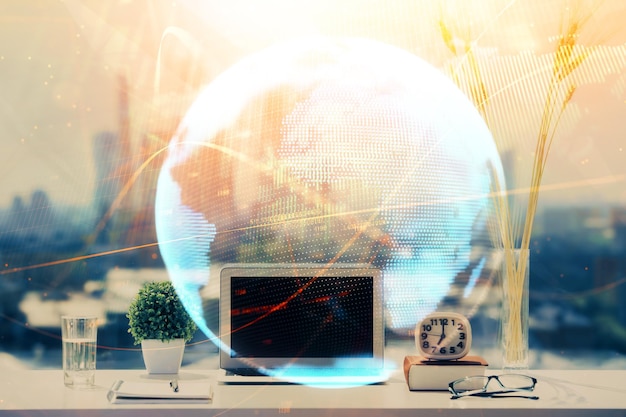 double exposure of business theme icons and work space with computer background concept of success