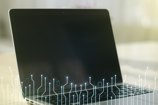 Double exposure of circuit hologram on laptop background Research and development hardware concept