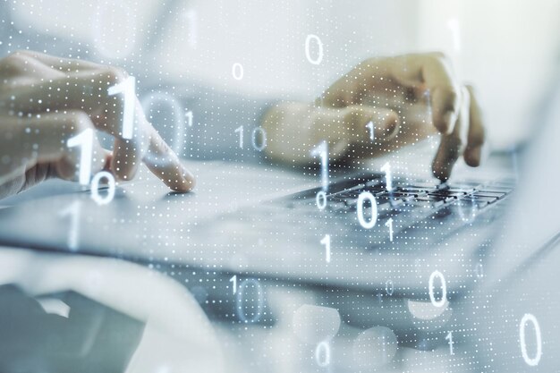 Double exposure of creative abstract binary code hologram and hands typing on laptop on background Database and programming concept