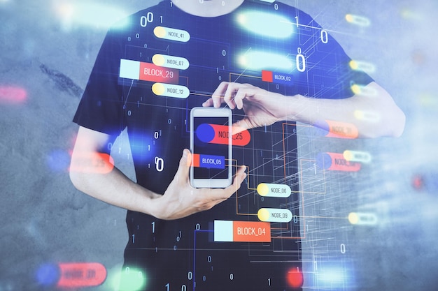 Double exposure of mans hand holding and using a digital device and data theme hologram drawing Technology concept