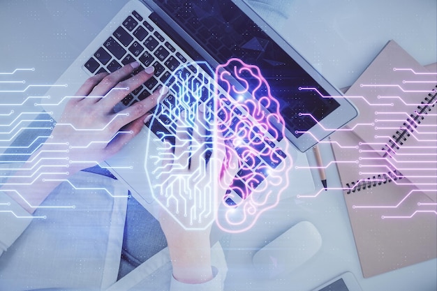 Double exposure of woman working on computer andhuman brain hologram drawing Top View Ai concept