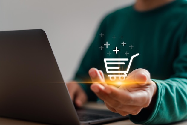 Ecommerce concept Businessman use laptop online shopping to digital cart with ecommerce global network connection ecommerce store online business convenience competitive price