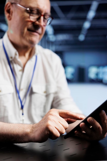 elderly engineer setting up vpn servers