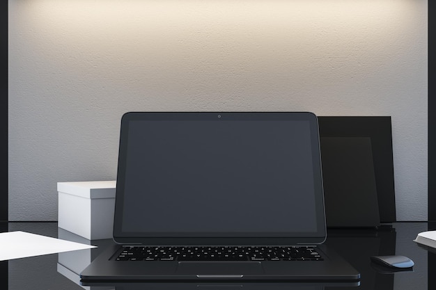 empty black mock up screen of laptop on table