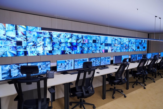 Empty interior of big modern security system control room