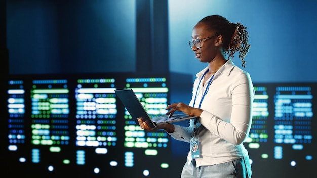executive strolls through data center