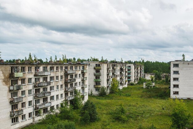 Exterior of abandoned apartment buildings in european ghost town