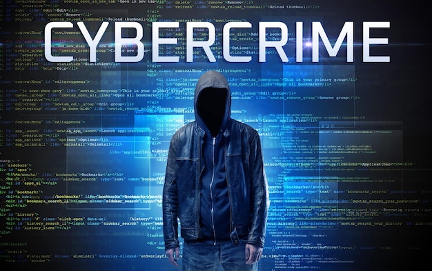 faceless hacker on code background