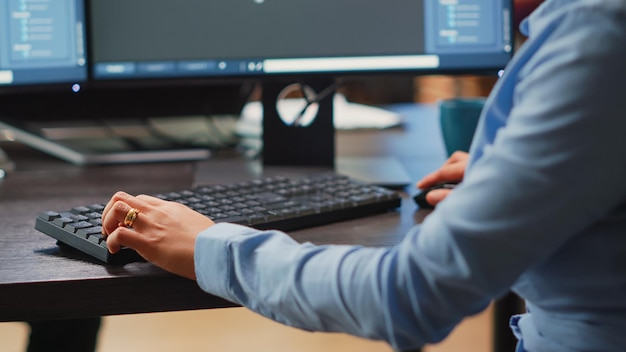 Female engineer working on computer to create 3d machine component, developing industrial engine product. Office employee usingcad software to manufacture mechanical prototype. Close up.