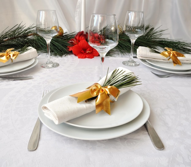 Festively decorated Christmas (New Year) a table for dinner