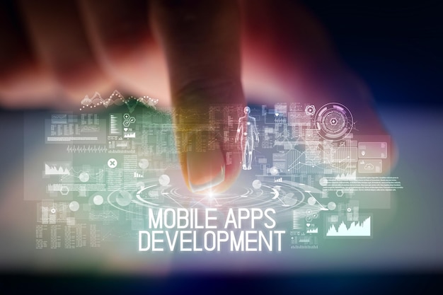 finger touching tablet with web technology icons and mobile apps development inscription