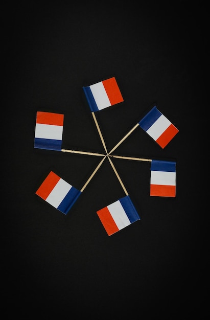 Flags against black background
