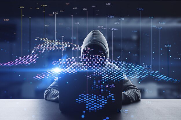 Front view of hacker using computers at desktop with abstract digital map and index lines on blurry interior background Global infographic hacking theft world and location concept Double exposure