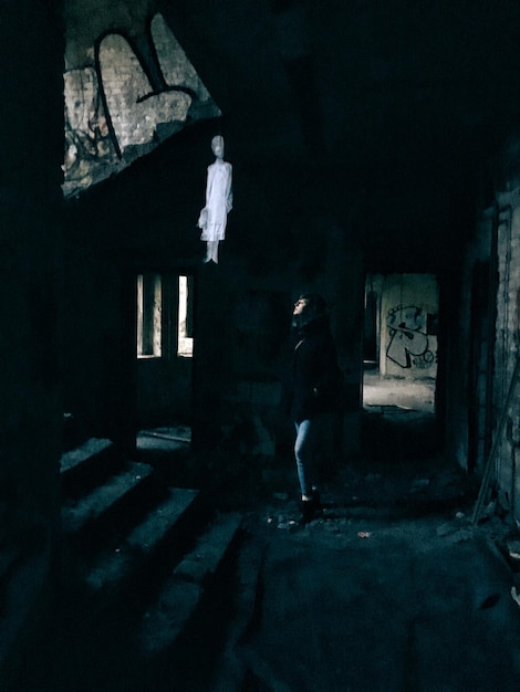 full length of woman walking at night