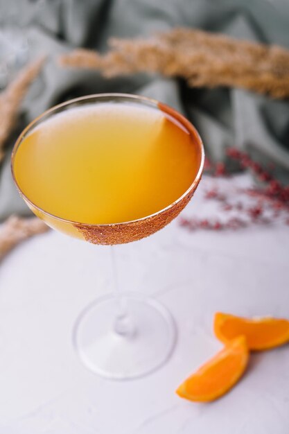 glass of sidecar orange cocktail closeup