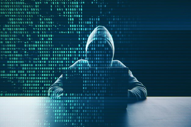Hacker at desk using laptop with creative digital binary code dots hologram Digital data hacking concept Double exposure