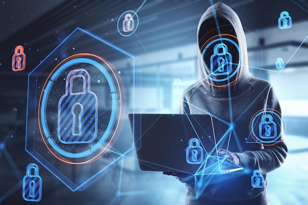 Hacker in blurry office interior using laptop with abstract glowing connected digital padlock hologram Computer safety hacking data theft and secure concept Double exposure