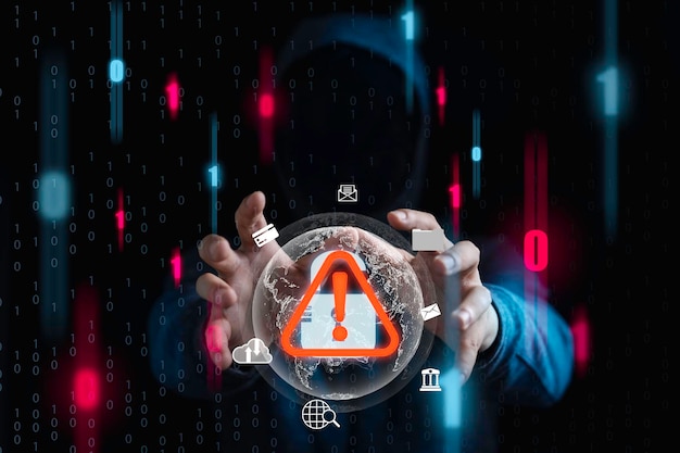 Hacker in hoodie holding red triangle caution warning sign and unlock master key for notification error from hacker malware and need maintenance concept