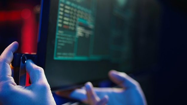 Hacker uploading USB flash drive with stolen data in PC