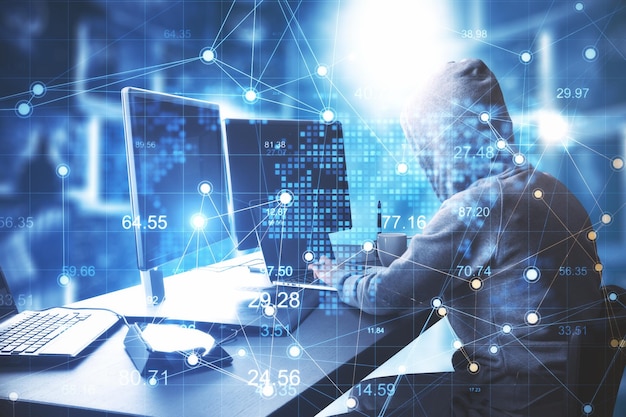Hacker using computer with creative glowing big data interface