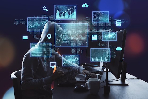 Hacker using computer with digital finance and data protection interface