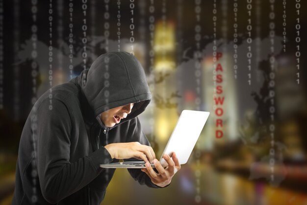 Hackers programmer using computer laptop for hack information and data from user account.