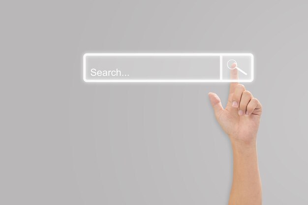 Hand click search button page on virtual screen Idea for searching browse data information networking Copy space for text