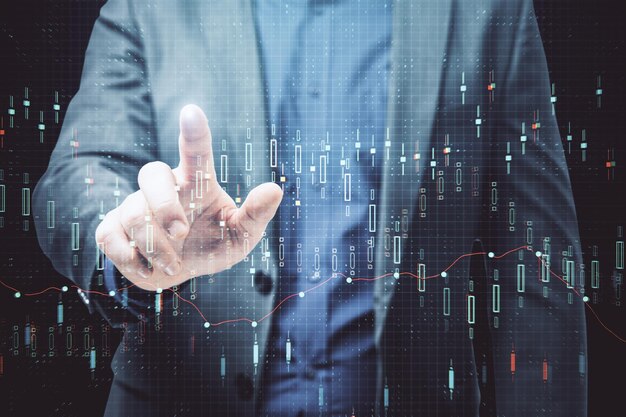 Hand pointing at creative candlestick forex chart