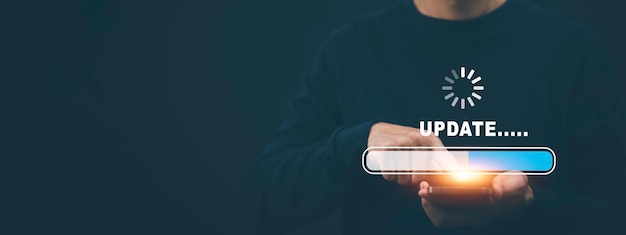 hand touch bar of update software computer program upgrade business technology internet update on virtual screen internet and technology concept loading bar with installing the update