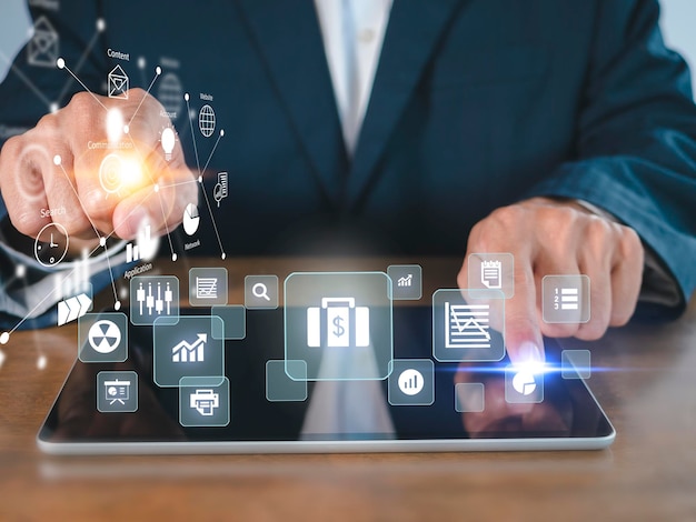hands of business man useing tablet use virtual screen ecommerce technology icons on virtual screen business global social media marketing concept