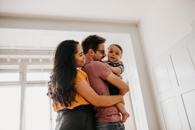 happy family standing at home