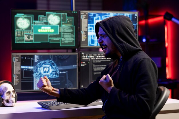 Happy rogue software developer getting access granted message after using ai malware undetectable by