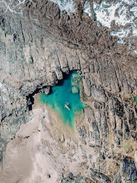 High angle view of rock formations in water