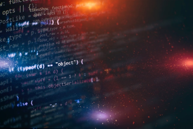 HTML5 in editor for website development. Website HTML Code on the Laptop Display Closeup Photo.