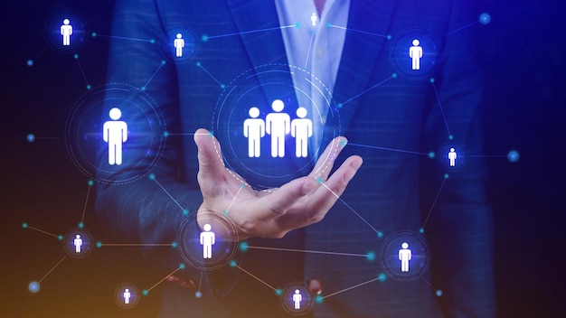 human resources hr management employment headhunting concept businessman holding modern social buttons on a virtual background