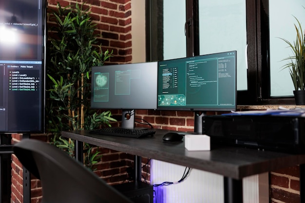 Image of two computer screens displaying software data information and integrated algorithms. Multiple display cyber security setup computing artificial intelligence communication program.
