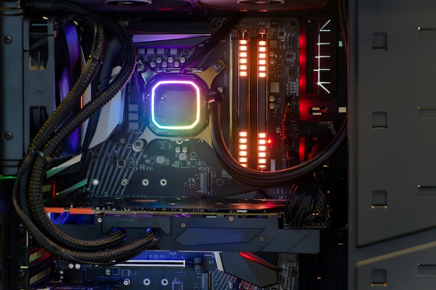 Inside high performance Desktop PC and Cooling system on CPU socket with multicolored LED RGB light show status on working