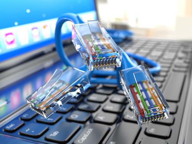 Internet concept. Laptop and ethernet cables. 3d